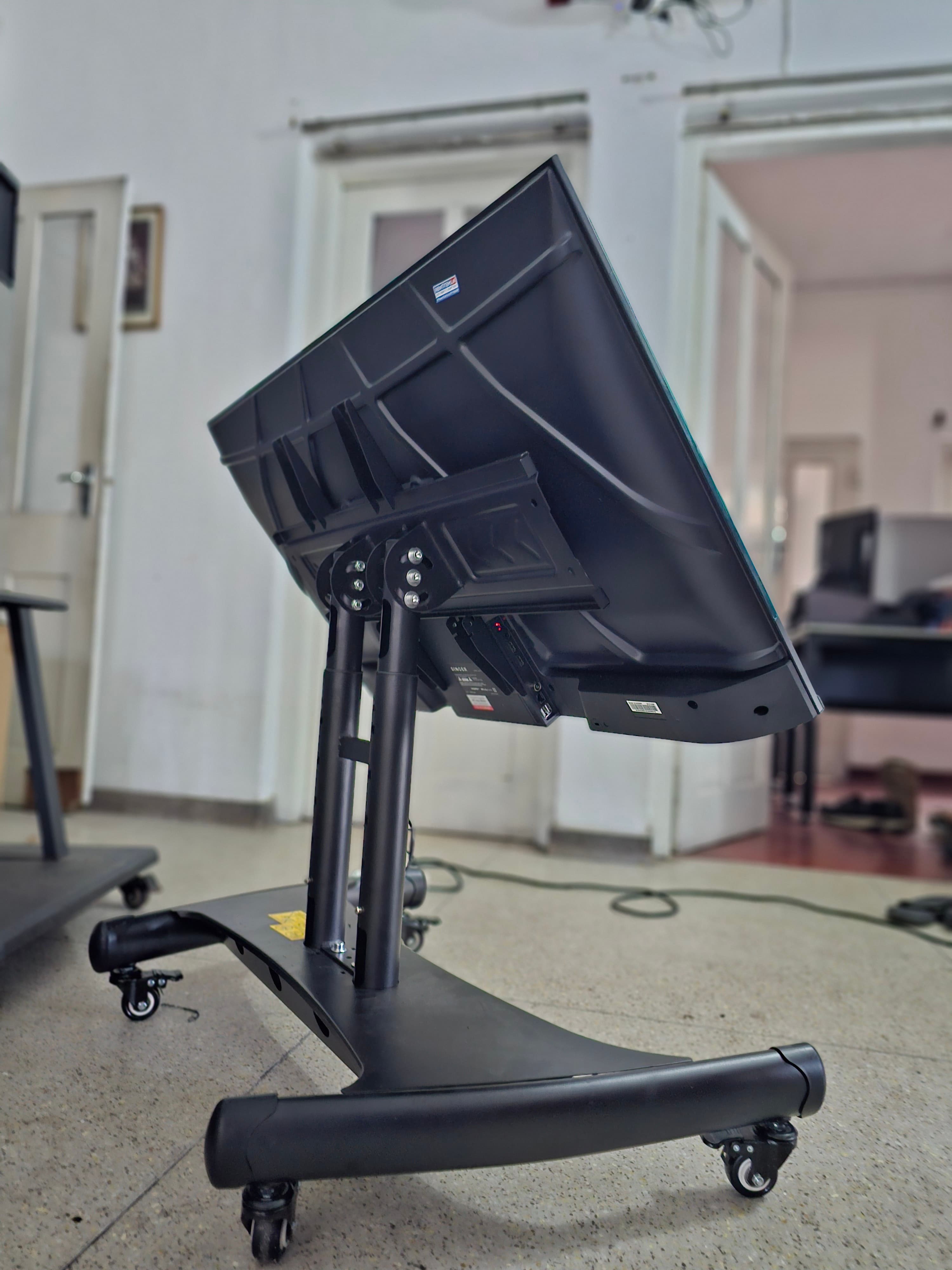 Trolley Movable Heavy Duty TV Stand 55"-75" in action 6