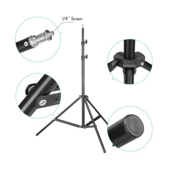 The tripod light stand providing stable lighting at a high-profile corporate semina