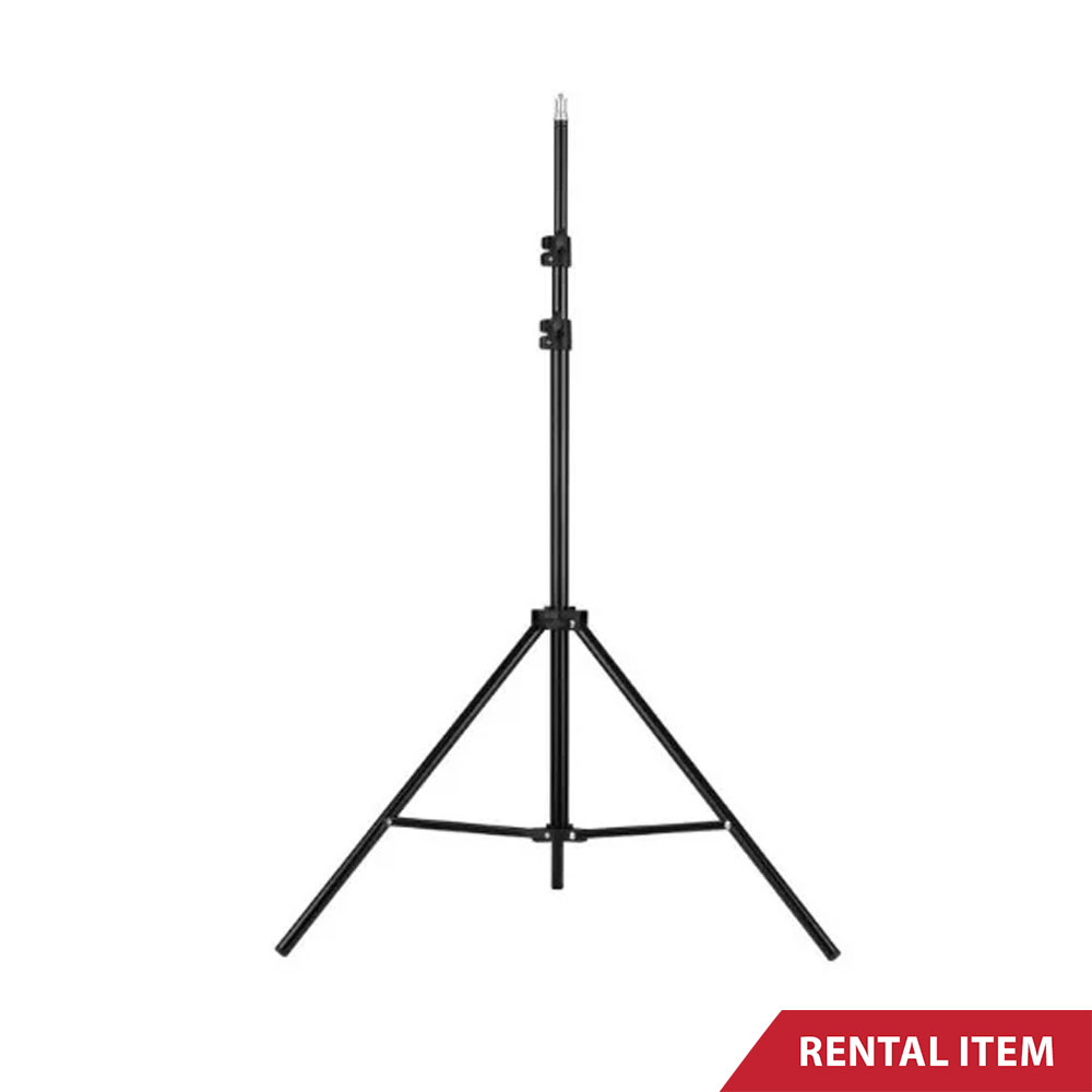 The tripod light stand enhancing professional lighting at a corporate event