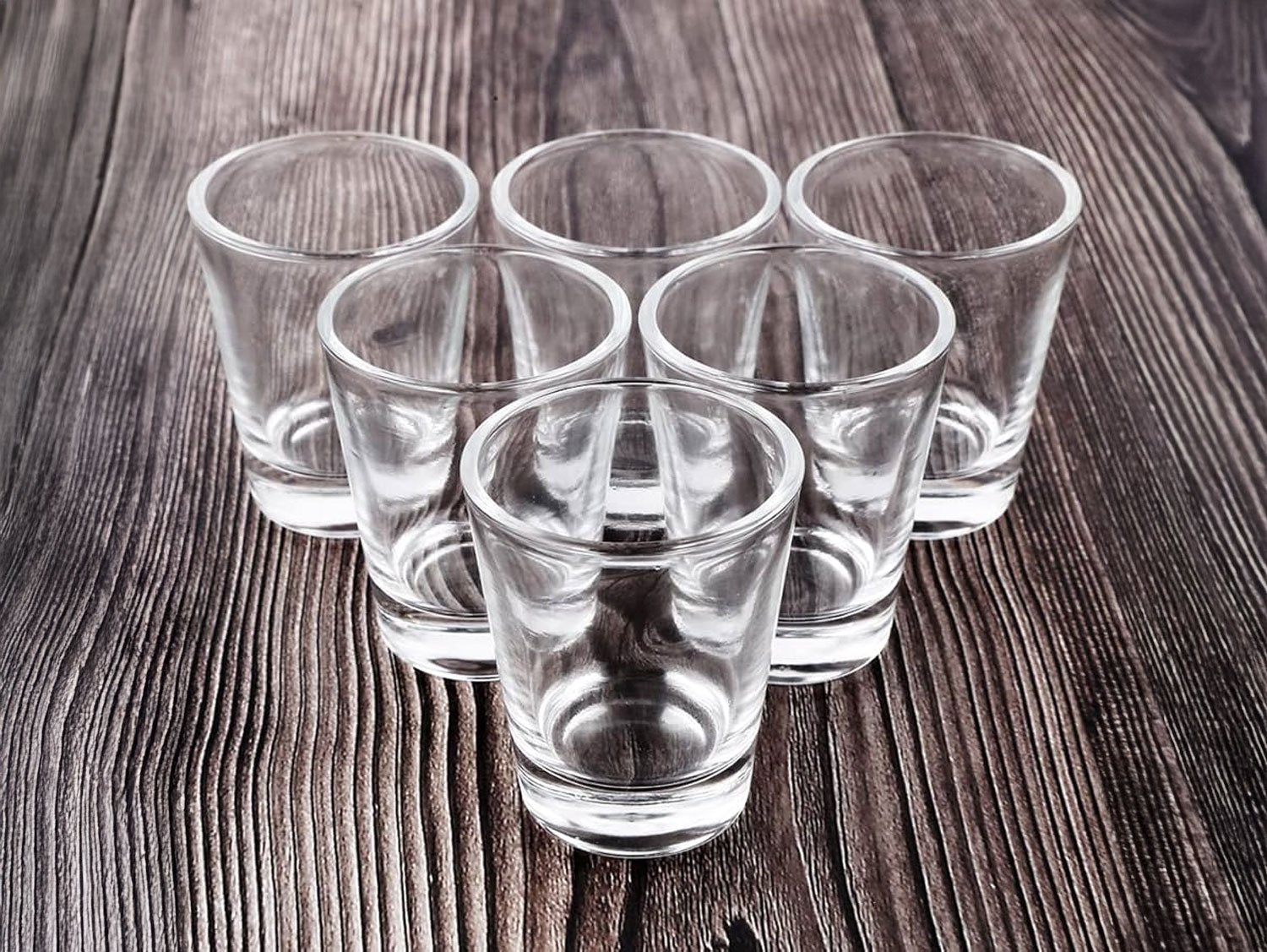Clear glass shot glasses arranged for party and event bar setup in Sri Lanka