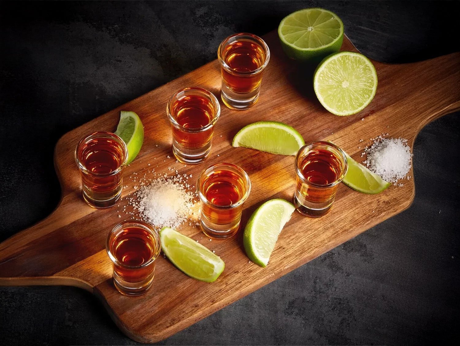 Clear glass shot glasses arranged for party and event bar setup in Sri Lanka